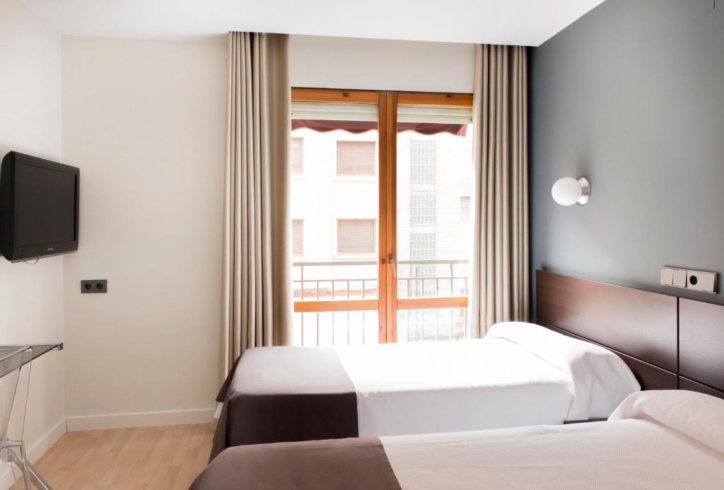 Hospedium Hostal Un Punto Chic Huesca Dış mekan fotoğraf